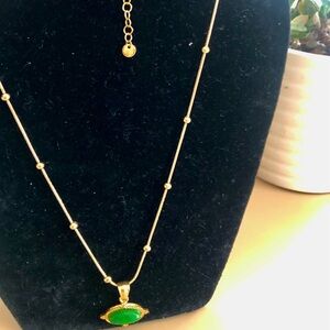 Elegant Gold Necklace with Green Pendant
